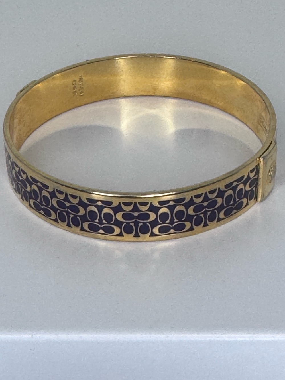 Coach Gold-Tone Bangle Bracelet with Purple Enamel Signature Pattern